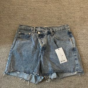 Jean shorts , brand new never worn, cross top